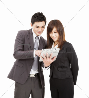 businessman and businesswoman using the tablet pc