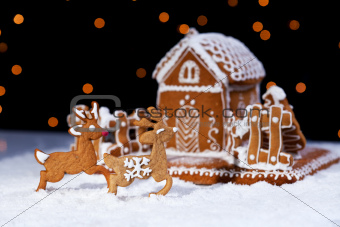 Christmas gingerbread cookie house and deers