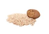 Grated nutmeg and whole nutmeg with grated face