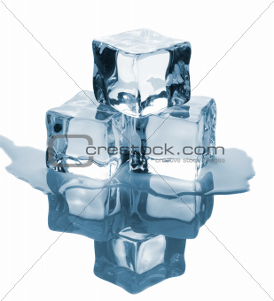 Three ice cubes with reflection