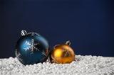 Christmas tree decoration toys on snow with copyspace