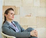 Portrait of confident business woman looking on copy space