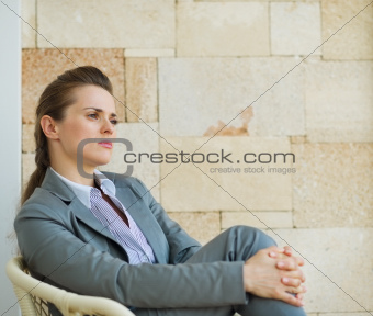 Portrait of confident business woman looking on copy space
