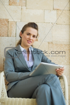 Business woman using tablet PC