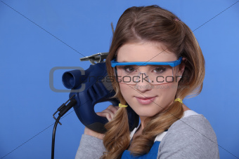 Attractive woman holding a jigsaw