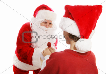 Santa Gives Lollipop to Boy