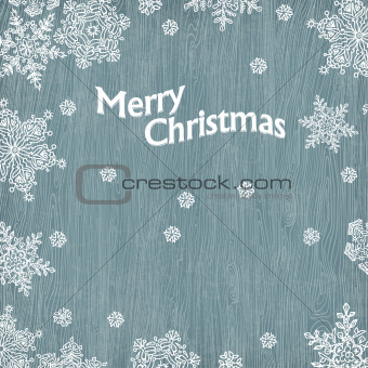 Christmas greetings with snowflakes on wooden texture. Vector il