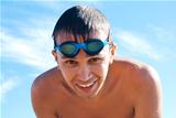 Young man in swimming goggles