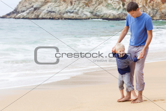 father and son at the beach