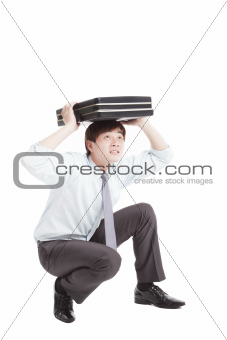 scared businessman with briefcase