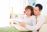 Asian couple with digital tablet computer