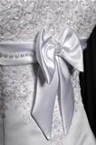 Detail of a weddings dress on a mannequin