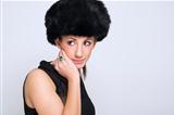 Beautiful woman modeling a fur hat