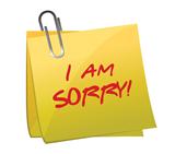 I am sorry message on a post it