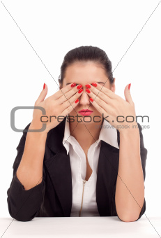 Business woman covering her eyes