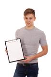 Young man holding clip board