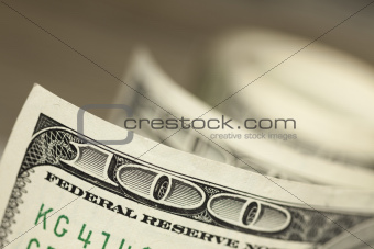 An Abstract of One Hundred Dollar Bills with Narrow Depth of Field.
