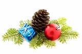 Christmas composition with a pine cone and toys.