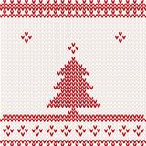 Knitted background with Christmas tree