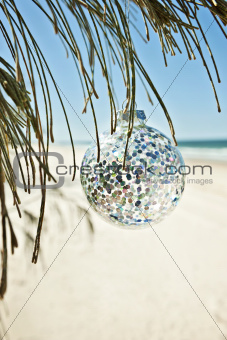 xmas bauble glass glittery at beach