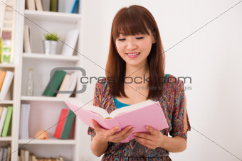 asian woman reading