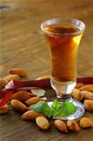 Almond liquor amaretto with whole nuts