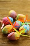 Easter decor eggs on wooden background