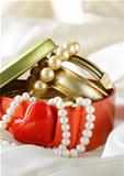 gift box with gold and pearl jewelry