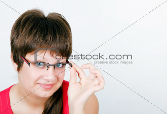 beautiful blue eyed young smiling girl in glasses