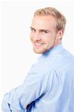 portrait of a young man with blond hair smiling - isolated on white