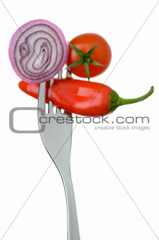 onion chilli and tomato on a fork