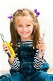 smiling girl with pliers and wrench