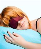 Sleeping Young Woman In Sleep Eye Mask