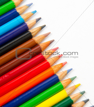 Colored Pencils in a Row on White