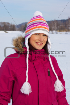 Smiling girl with winter cap