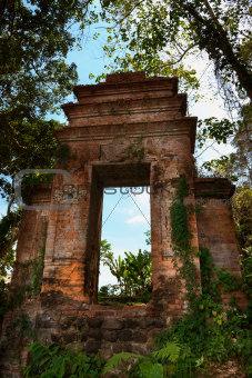 Old ruined doorway in a forest