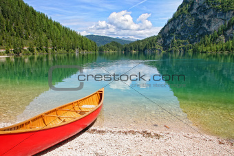 Lake Lago di Braies with canoe in Dolomiti Mountains - Italy Eur