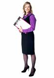 Smiling business woman with documents