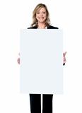 Business woman showing blank signboard