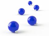 row of blue christmas balls on white background