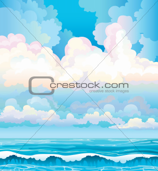 Clouds on a blue sky and sea with waves