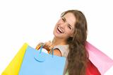 Portrait of smiling young woman with shopping bags