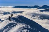 climbing the mountain in winter