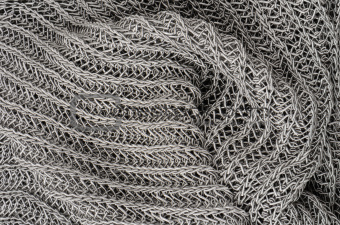 close up gray knitted pullover background
