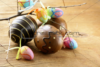 Easter decor eggs on wooden background