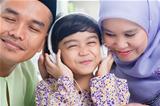 Asian family listen mp3 headphone