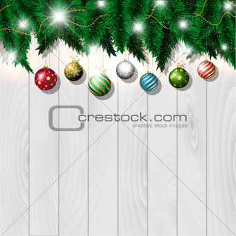 Christmas baubles on wood