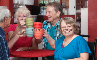 Senior Group Toasting Drinks