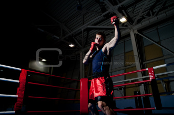 Man boxing in gym