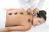 Female receiving a relaxing massage treatment